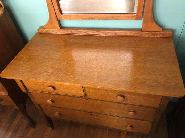 ANTIQUE MIRRORED DRESSER ON CASTERS